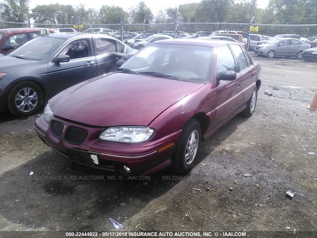 1G2NE52T1VM559928 - 1997 PONTIAC GRAND AM SE RED photo 2