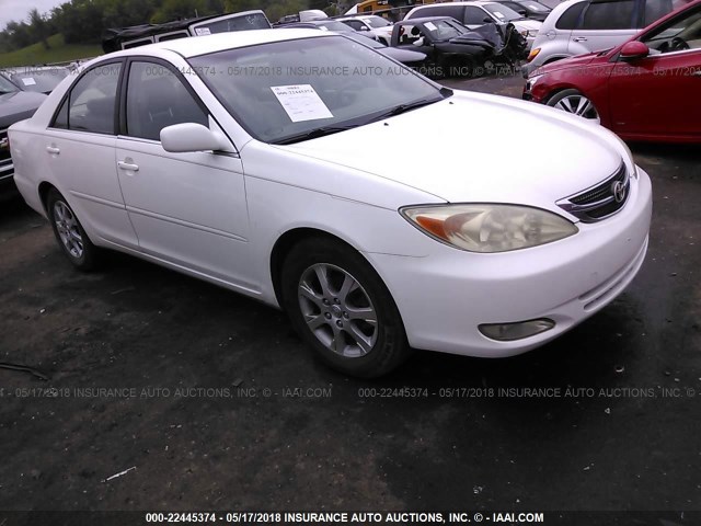 JTDBE32K940278301 - 2004 TOYOTA CAMRY LE/XLE WHITE photo 1