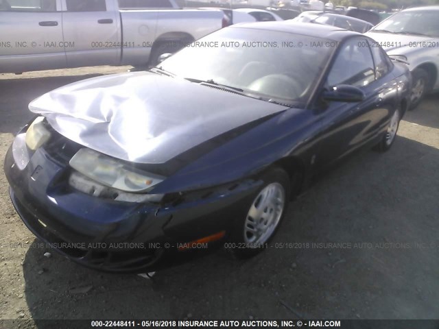 1G8ZR1273XZ347321 - 1999 SATURN SC2 Navy photo 2