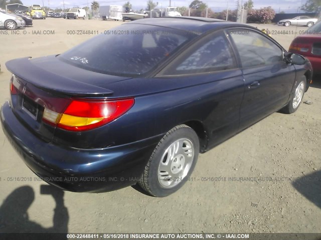 1G8ZR1273XZ347321 - 1999 SATURN SC2 Navy photo 4