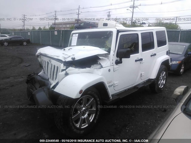 1C4HJWEG5DL616497 - 2013 JEEP WRANGLER UNLIMITE SAHARA WHITE photo 2
