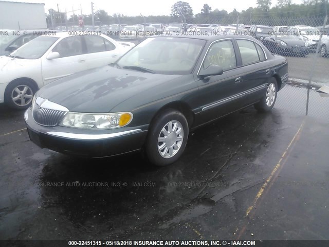 1LNHM97V6XY642856 - 1999 LINCOLN CONTINENTAL  Կանաչ լուսանկար 2