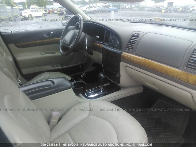 1LNHM97V6XY642856 - 1999 LINCOLN CONTINENTAL  Կանաչ լուսանկար 5