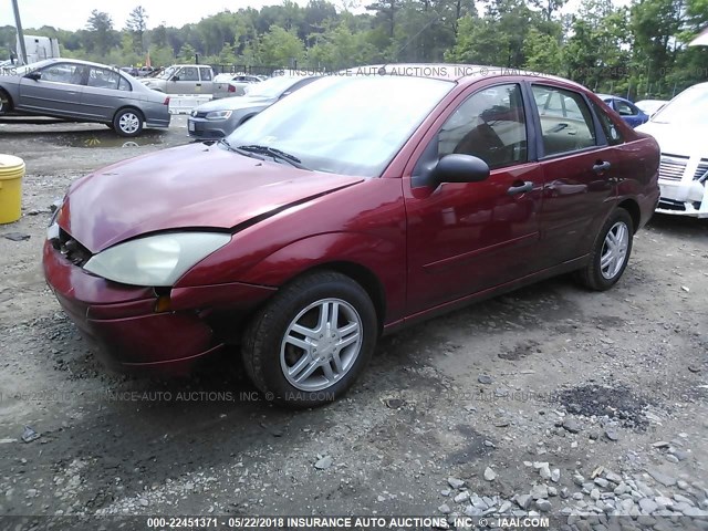 1FAHP34303W249295 - 2003 FORD FOCUS SE COMFORT/SE SPORT MAROON photo 2