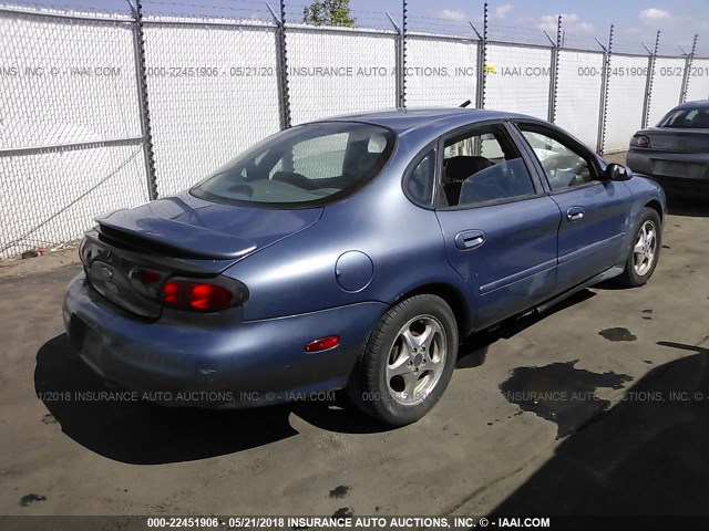 1FAFP53S5XG210939 - 1999 FORD TAURUS SE/COMFORT/SPORT BLUE photo 4