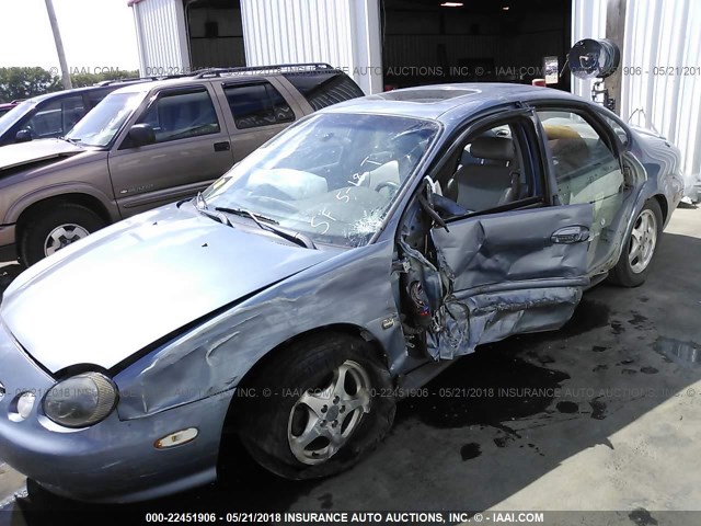 1FAFP53S5XG210939 - 1999 FORD TAURUS SE/COMFORT/SPORT BLUE photo 6