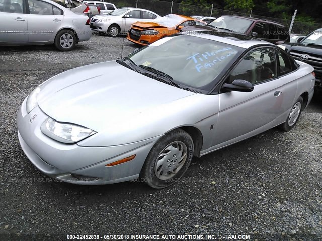 1G8ZP12822Z186256 - 2002 SATURN SC1 SILVER photo 2