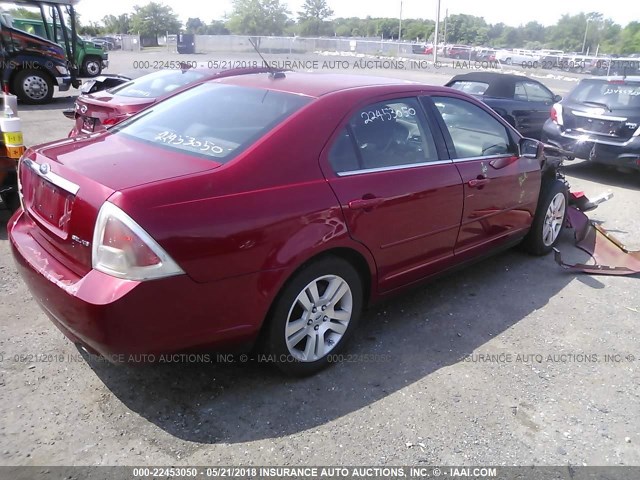 3FAHP08129R108151 - 2009 FORD FUSION SEL RED photo 4