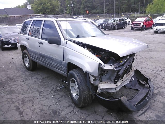 1J4GZ58S5VC516197 - 1997 JEEP GRAND CHEROKEE LAREDO/TSI SILVER photo 1