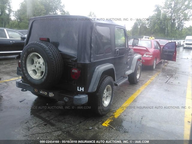 1J4FA49S12P774216 - 2002 JEEP WRANGLER / TJ SPORT BLACK photo 4