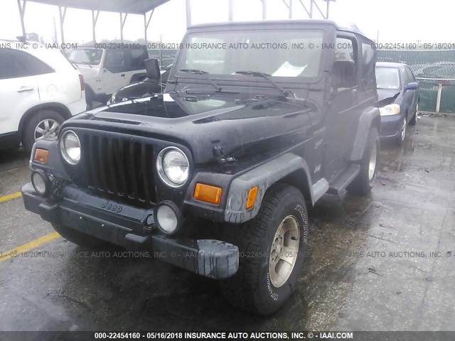 1J4FA49S12P774216 - 2002 JEEP WRANGLER / TJ SPORT BLACK photo 6