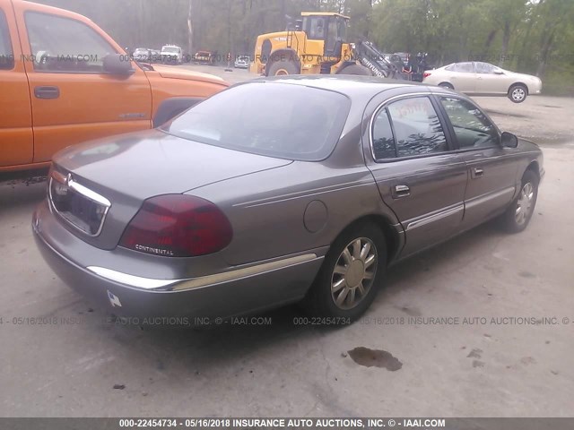 1LNHM97V62Y687336 - 2002 LINCOLN CONTINENTAL  GRAY photo 4