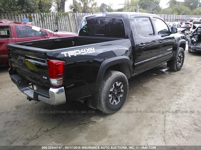 5TFCZ5AN5HX095314 - 2017 TOYOTA TACOMA DBL CAB/SR/TRDSPT/OR/PRO BLACK photo 4