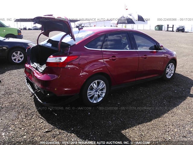 1FAHP3H24CL144973 - 2012 FORD FOCUS SEL RED photo 4