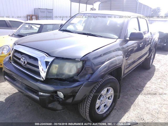 3TMLU42N59M032499 - 2009 TOYOTA TACOMA DOUBLE CAB ნაცრისფერი ფოტო 2