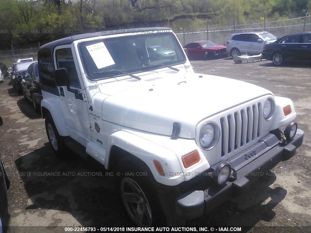 1J4FA59S9YP775192 - 2000 JEEP WRANGLER / TJ SAHARA WHITE photo 1