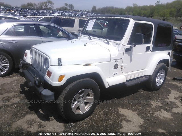 1J4FA59S9YP775192 - 2000 JEEP WRANGLER / TJ SAHARA WHITE photo 2