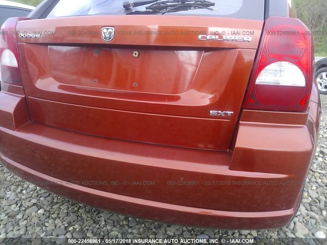 1B3HB48A59D131899 - 2009 DODGE CALIBER SXT ORANGE photo 6