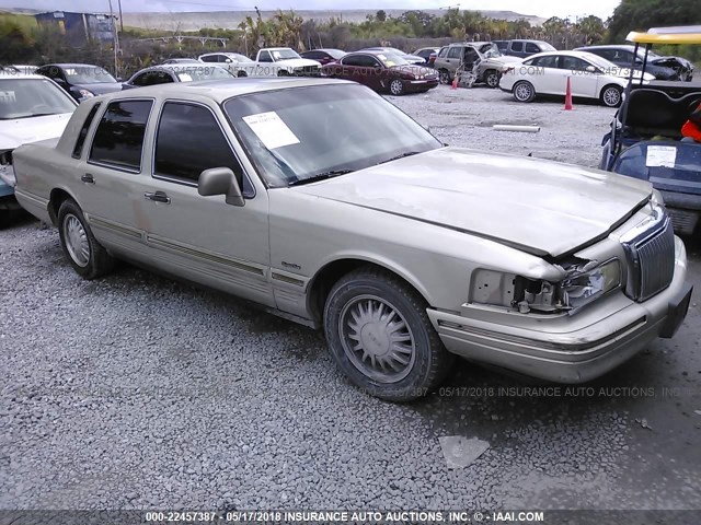 1LNLM82W1VY657525 - 1997 LINCOLN TOWN CAR SIGNATURE/TOURING GOLD photo 1
