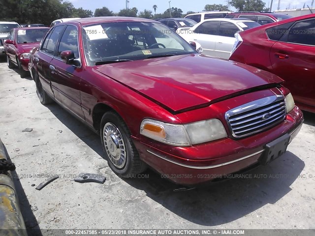 2FAFP73W3XX131312 - 1999 FORD CROWN VICTORIA  RED photo 1