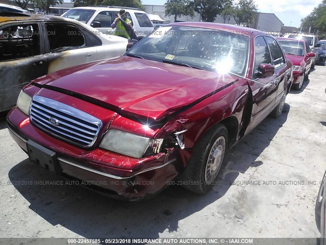 2FAFP73W3XX131312 - 1999 FORD CROWN VICTORIA  RED photo 2