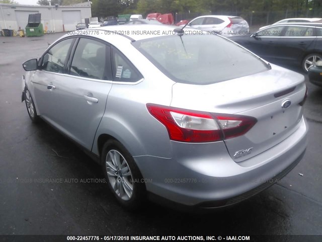 1FAHP3H21CL287010 - 2012 FORD FOCUS SEL SILVER photo 3