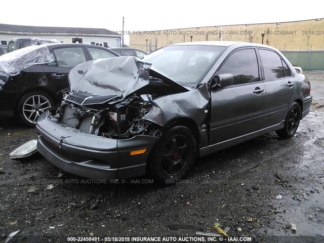 JA3AJ86E92U017988 - 2002 MITSUBISHI LANCER OZ RALLY GRAY photo 2