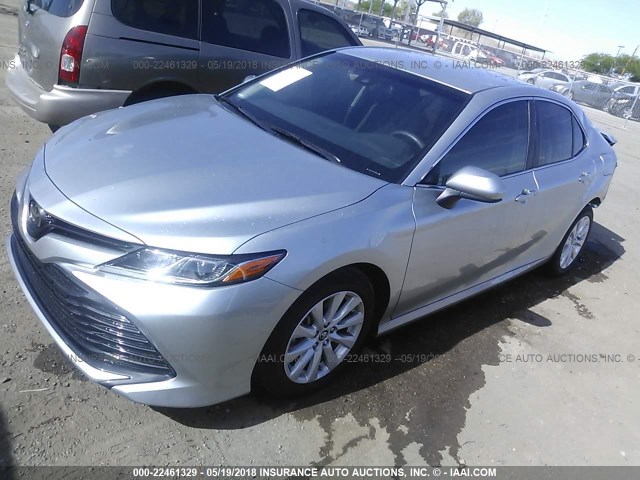 JTNB11HK2J3035801 - 2018 TOYOTA CAMRY L/LE/XLE/SE/XSE SILVER photo 2