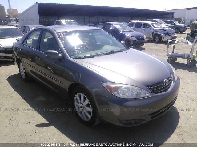 4T1BF30KX2U507182 - 2002 TOYOTA CAMRY LE/XLE/SE GRAY photo 1