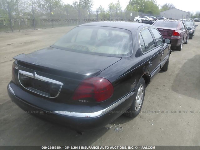 1LNFM97V6WY640451 - 1998 LINCOLN CONTINENTAL  BLACK photo 4