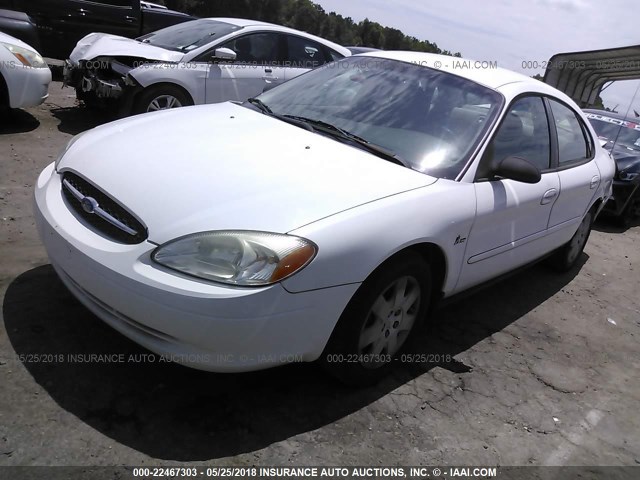 1FAFP5222YA154688 - 2000 FORD TAURUS LX WHITE photo 2