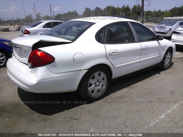 1FAFP5222YA154688 - 2000 FORD TAURUS LX WHITE photo 4