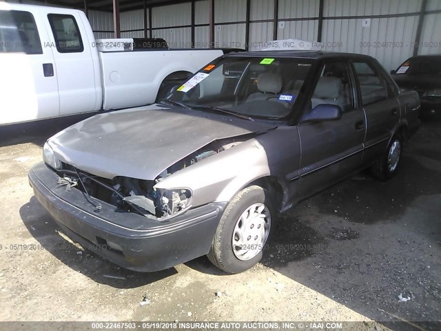 1Y1SK5164LZ077548 - 1990 GEO PRIZM LSI TAN photo 2