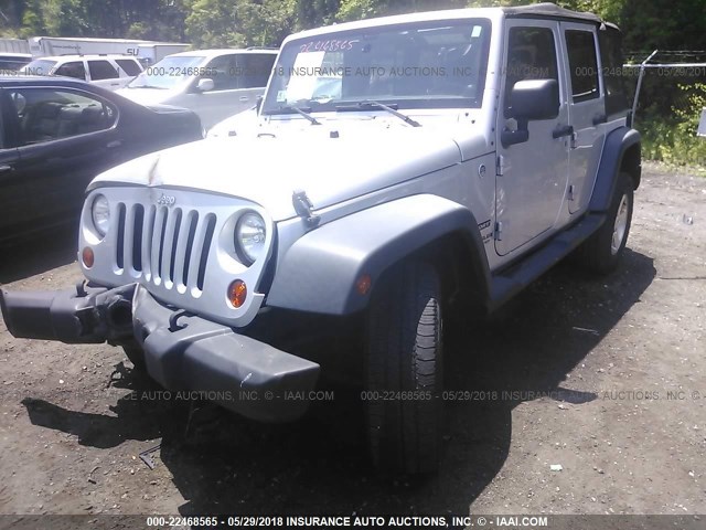 1J4HA3H1XBL508468 - 2011 JEEP WRANGLER UNLIMITE SPORT SILVER photo 2