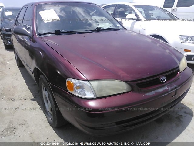 1NXBR12EXYZ302912 - 2000 TOYOTA COROLLA VE/CE/LE RED photo 1