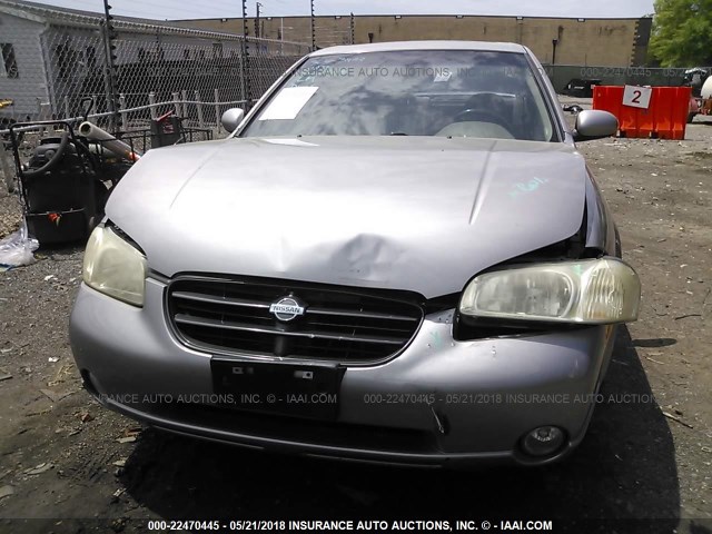 JN1CA31D9YT513533 - 2000 NISSAN MAXIMA GLE/GXE/SE GRAY photo 6