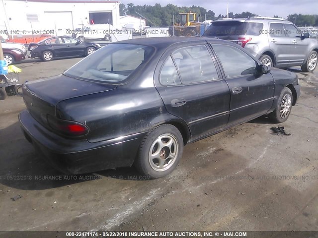 1Y1SK5267VZ448655 - 1997 GEO PRIZM LSI BLACK photo 4