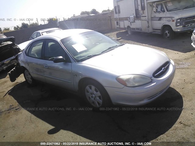 1FAFP5228YG203924 - 2000 FORD TAURUS LX WHITE photo 1