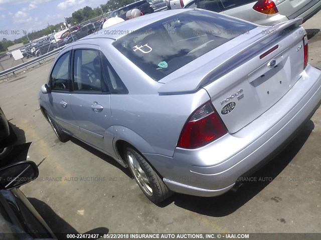 1FAHP38Z65W137585 - 2005 FORD FOCUS ZX4 ST Light Blue photo 3