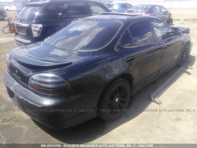 1G2WR5219YF152942 - 2000 PONTIAC GRAND PRIX GTP BLACK photo 4