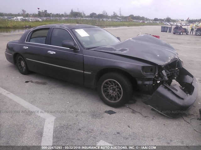 1LNHM82W8XY659281 - 1999 LINCOLN TOWN CAR SIGNATURE GRAY photo 1