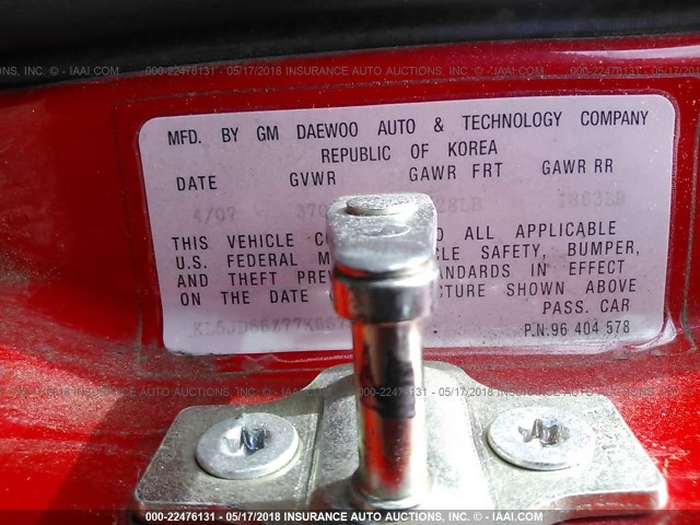 KL5JD66Z77K667895 - 2007 SUZUKI RENO CONVENIENCE RED photo 9