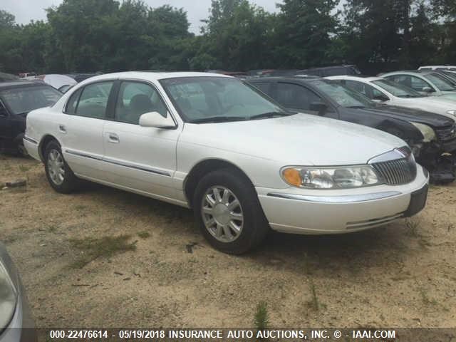 1LNHM97V52Y699820 - 2002 LINCOLN CONTINENTAL  Unknown photo 1