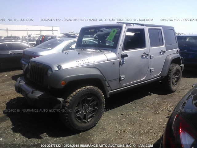 1C4BJWDG7FL580516 - 2015 JEEP WRANGLER UNLIMITE SPORT GRAY photo 2