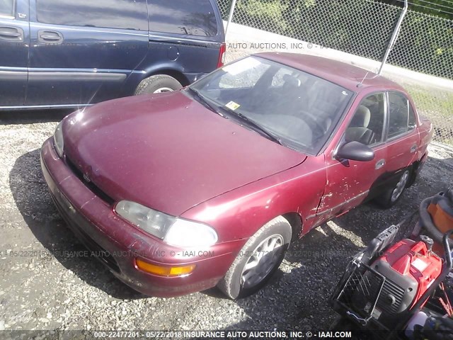 1Y1SK5383RZ003366 - 1994 GEO PRIZM LSI RED photo 2