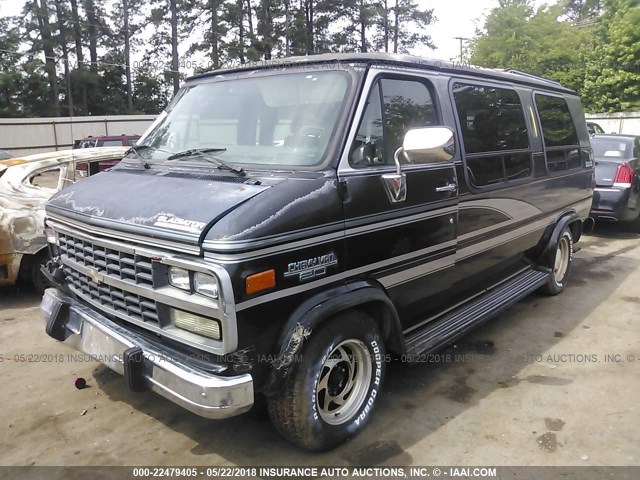 1GBEG25K0RF160451 - 1994 CHEVROLET G20 BLACK photo 2