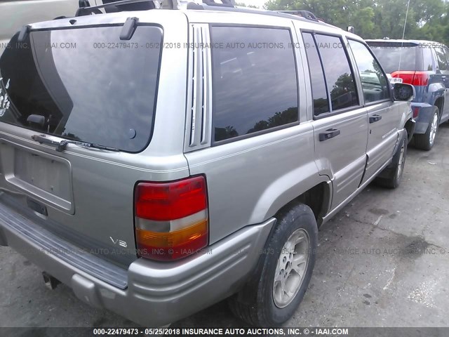 1J4GZ78Y7VC556944 - 1997 JEEP GRAND CHEROKEE LIMITED/ORVIS SILVER photo 4