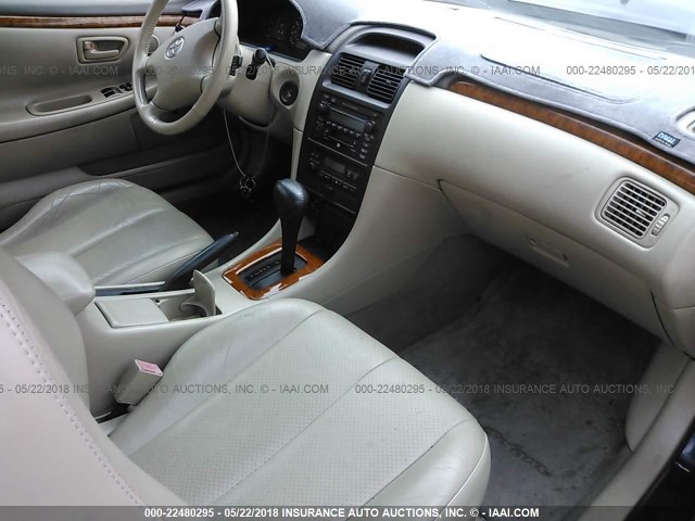 2T1CF28P32C601162 - 2002 TOYOTA CAMRY SOLARA SE/SLE ლურჯი ფოტო 5