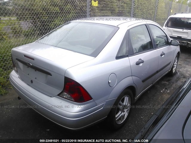 1FAFP33P03W156532 - 2003 FORD FOCUS LX SILVER photo 4