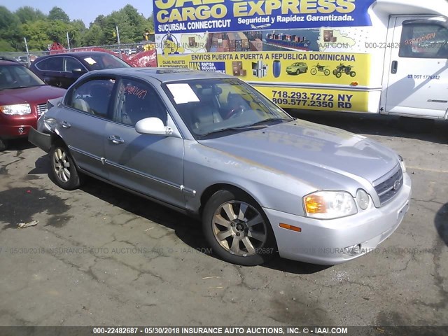 KNAGD128X45353279 - 2004 KIA OPTIMA LX/EX GRAY photo 1